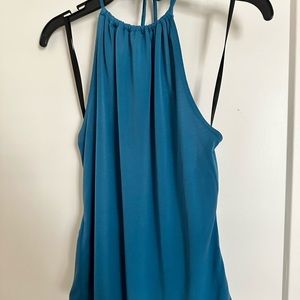 Blue BCBGeneration top. Strappy open-back detail.